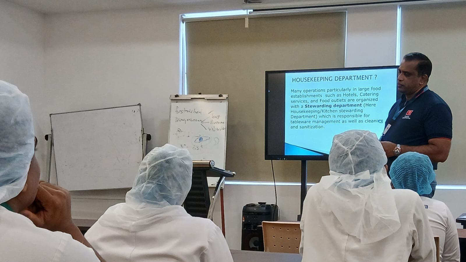 Janaka Rajanayake teaching an AMICUS classroom session